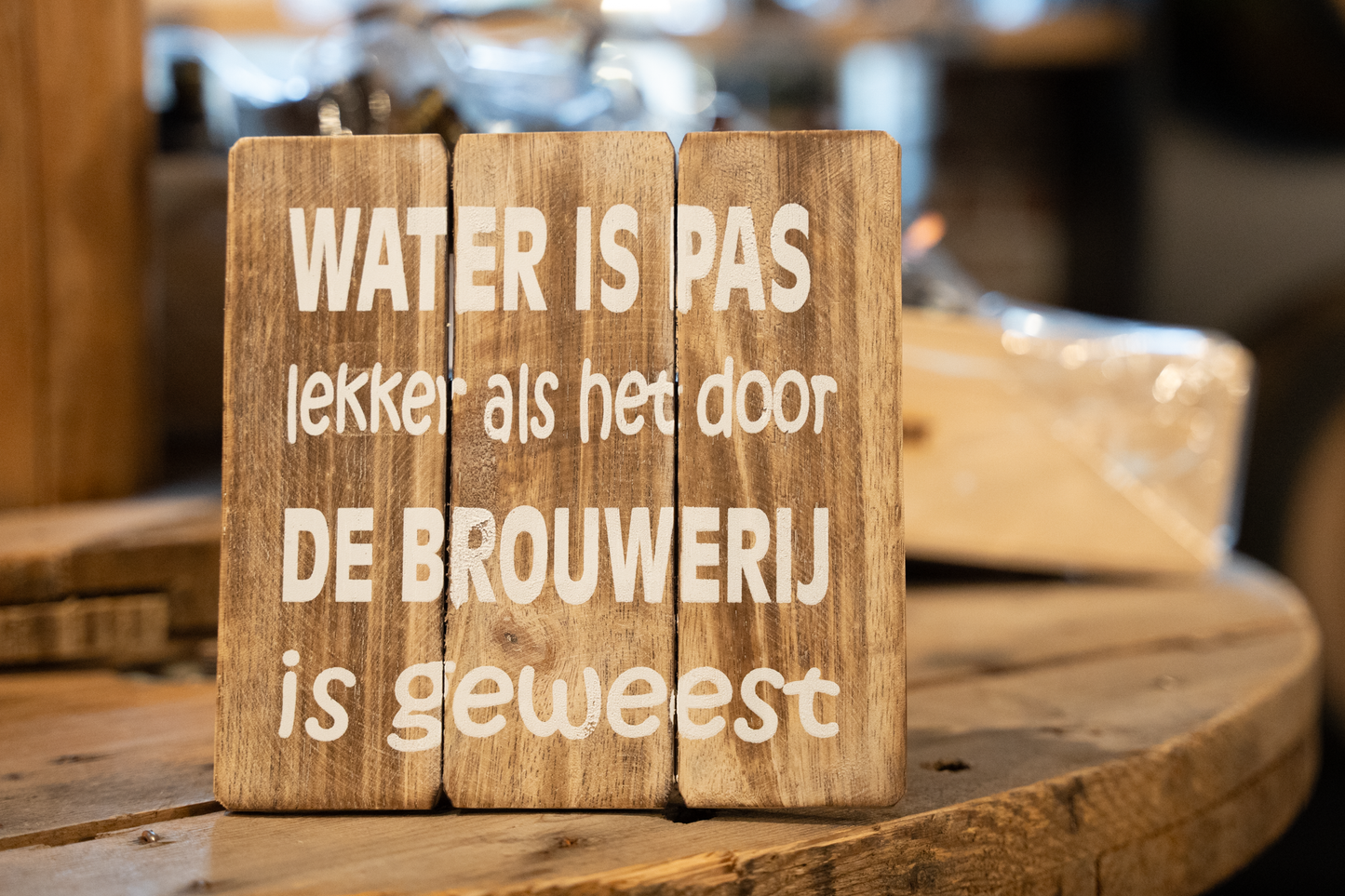 Houten bord 'Water is pas lekker als het door de brouwerij is geweest'